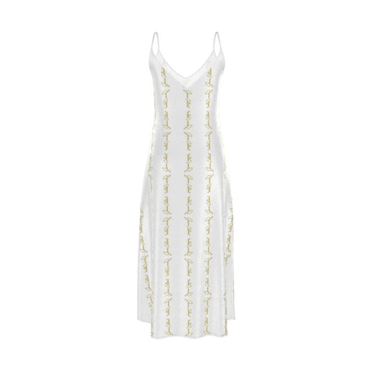 White slip dress with V-neckline, thin straps, and gold script embroidery detail