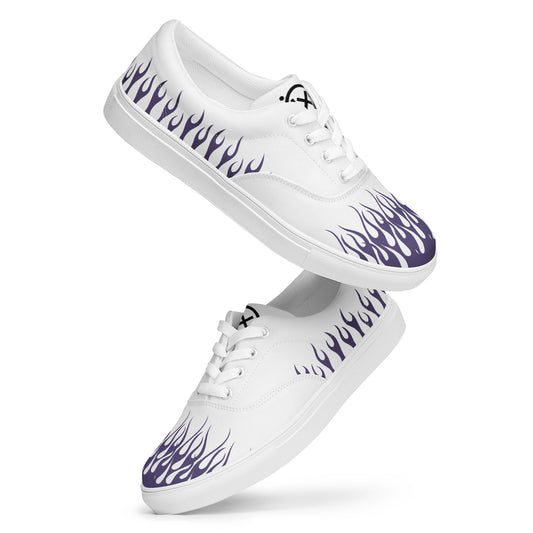 White canvas low-top sneakers with purple flame print and white laces.