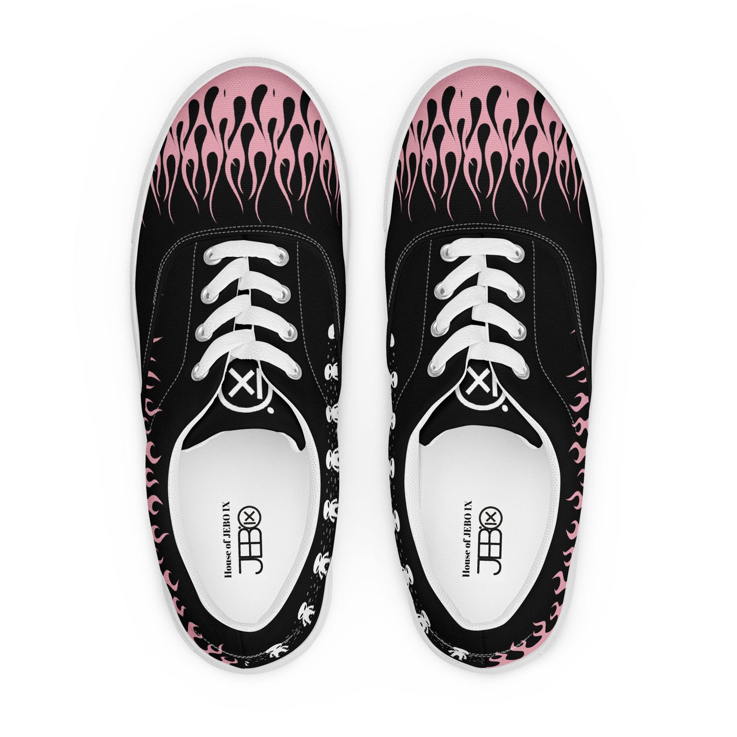 Black sneakers front view with pink flame upper, lace-up eyelets, white tongue label