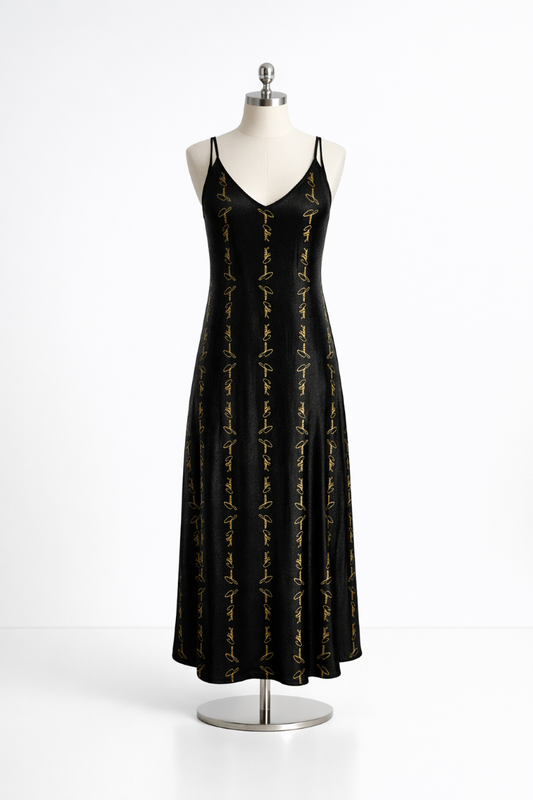 Black formal dress with gold script detailing displayed on a mannequin in a white studio — House of JEBO.