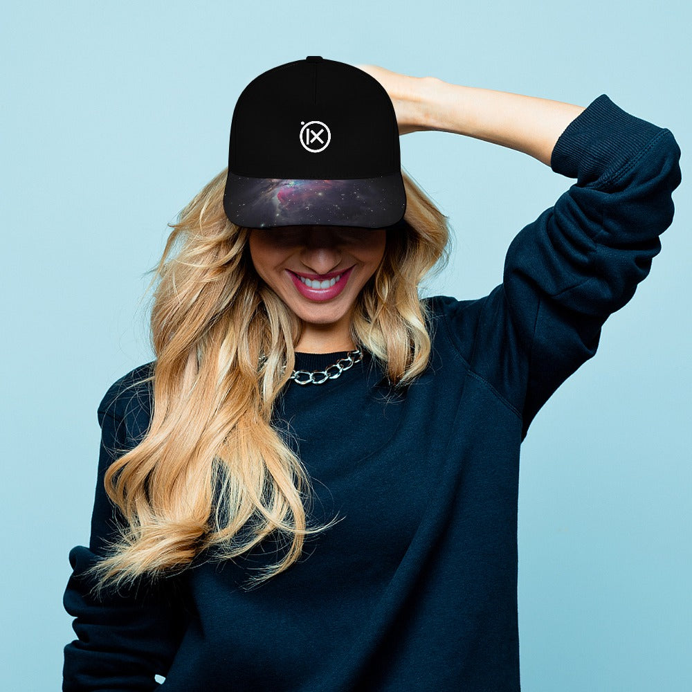 Black baseball cap with iX logo and galaxy-pattern brim on model