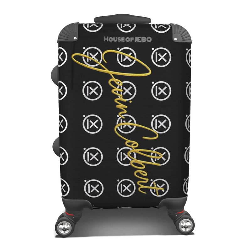 Hardshell suitcase, black with House of Jebo graphic and yellow lace pattern; four spinner wheels