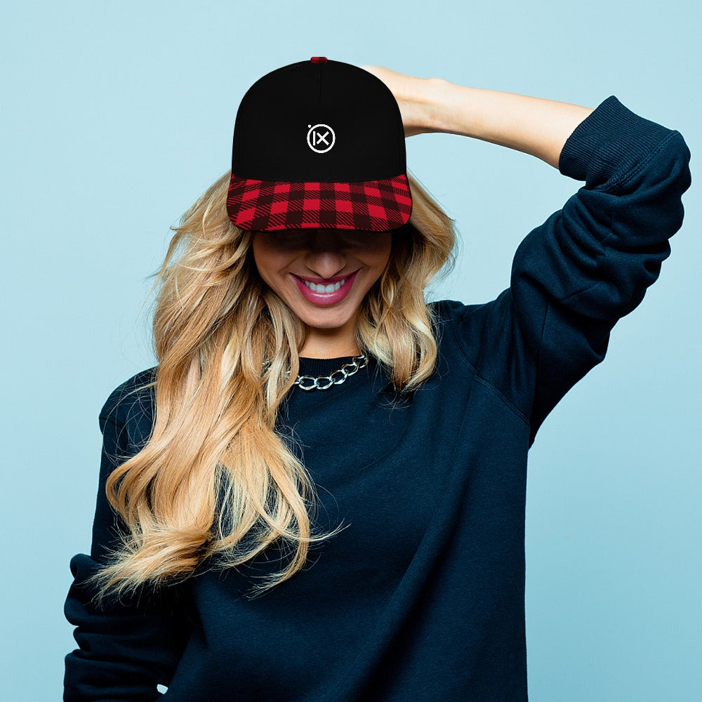 Black baseball cap with red plaid brim, Ix logo on front panel.