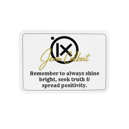Brand patch with gold logo text and motivational message on white backing