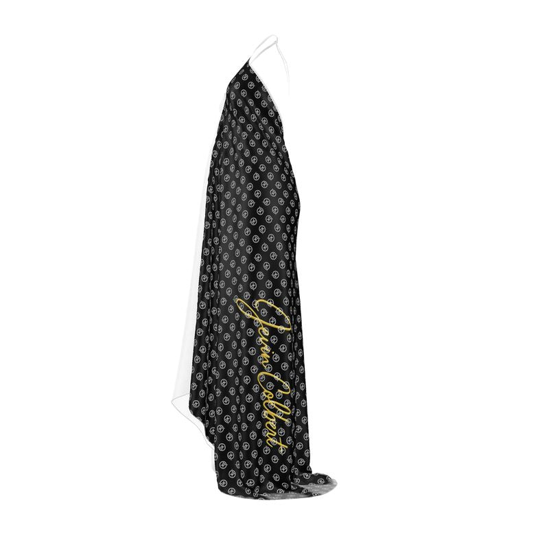 Backless halterneck dress with black repeating emblem print and gold lace trim along side