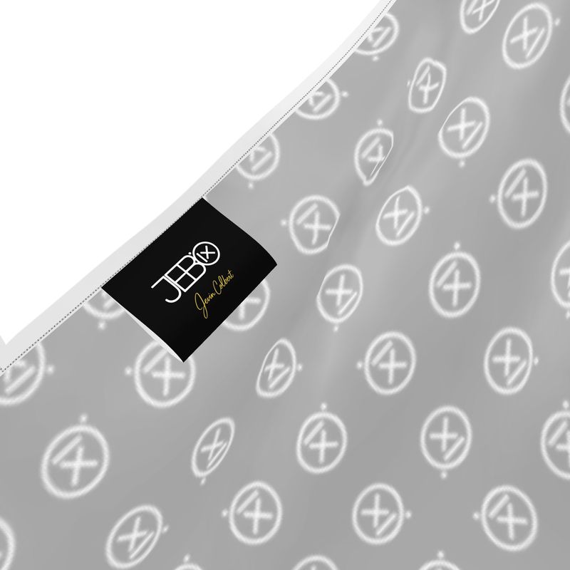 Fabric swatch with repeating light icon print on dark base