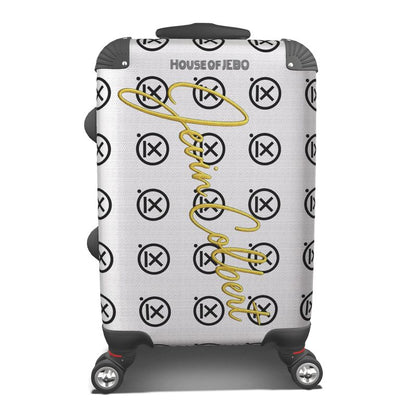 White travel suitcase with yellow line-art music and black circular icon pattern, wheels