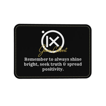 Black leather label patch with Jevin Colbert logo and quote text
