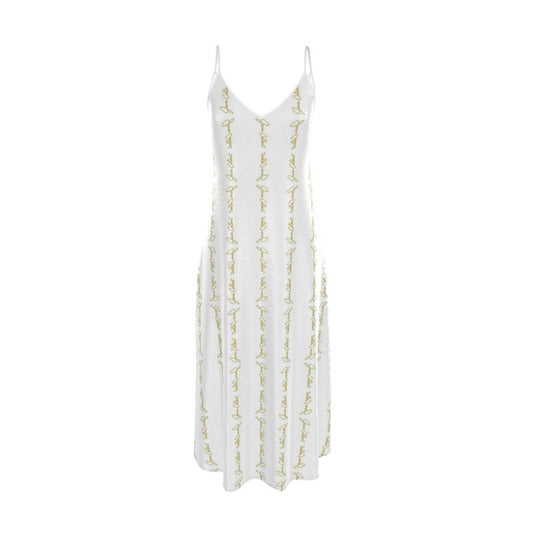 White slip dress with thin spaghetti straps and allover gold script embroidery