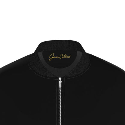 Men's black bomber jacket collar close-up with gold logo and front zipper