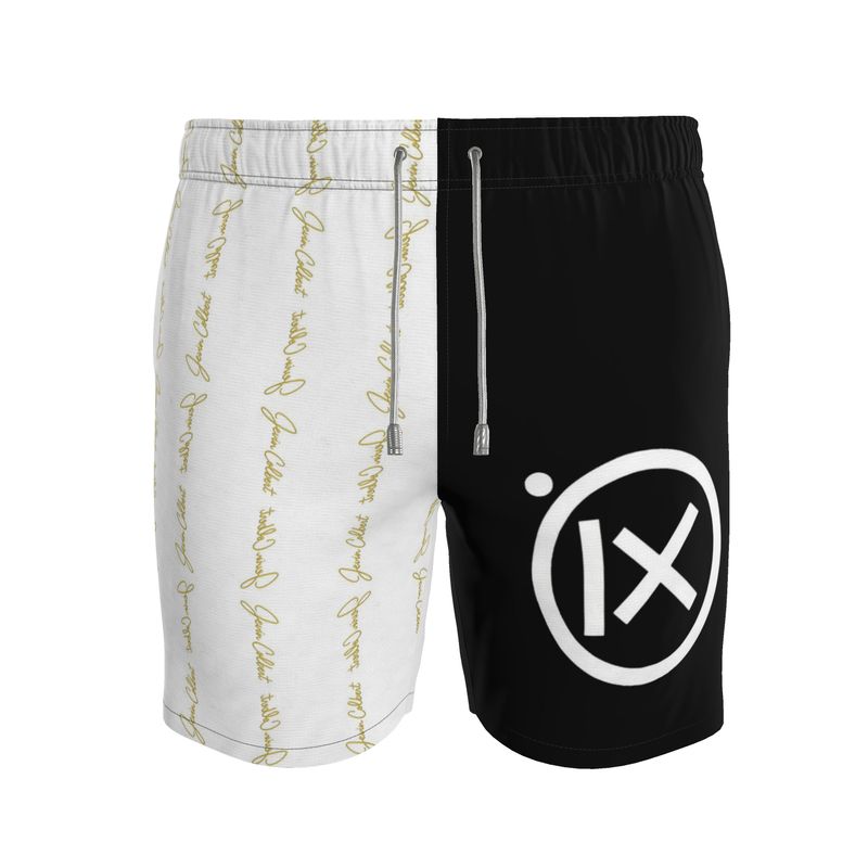 Two-tone men's swim shorts, black and white with gold script and drawstring