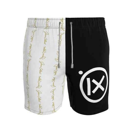 Two-tone men's swim shorts, black and white with gold script and drawstring