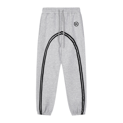 Heather gray joggers with black side stripe, elastic waistband, and drawstring cuffs