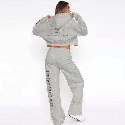 Women’s fleece tracksuit set in gray: hooded zip jacket and wide-leg pants with side print