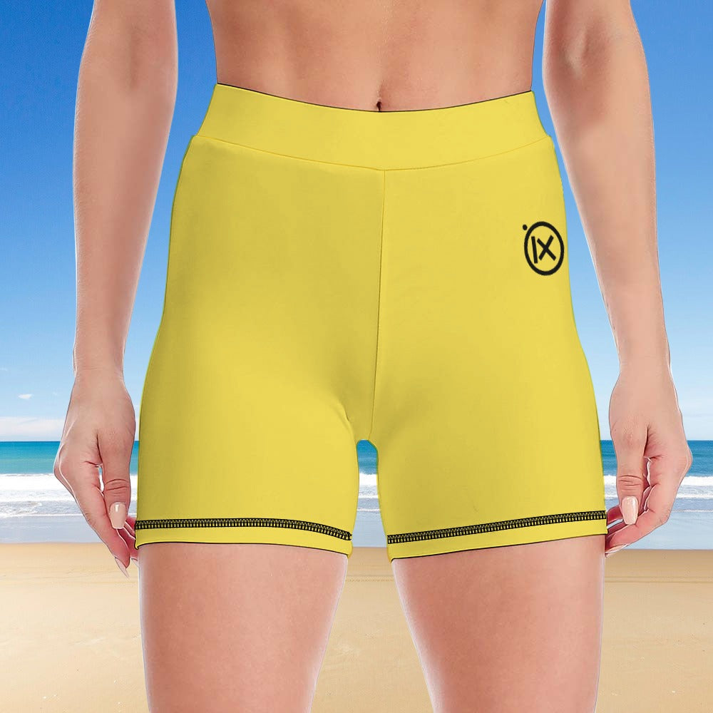Women's two-piece yoga set, yellow shorts with black-trim hem and small logo on leg