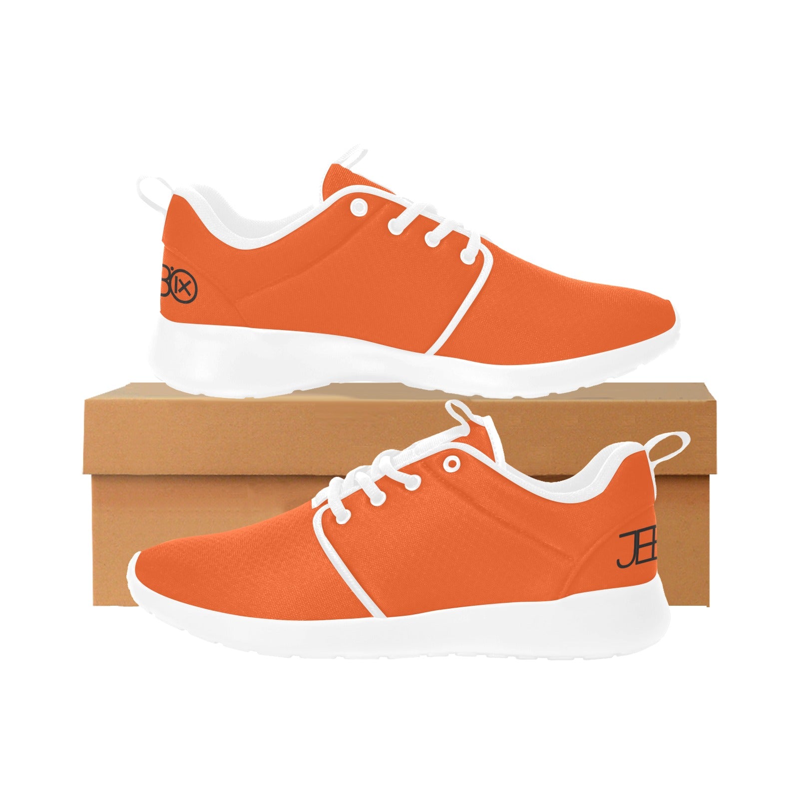 Men's running shoes, orange upper with white trim, shown on cardboard box