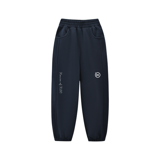 Kids fleece jogger in dark navy with elastic waistband, side pockets, cuffed hem