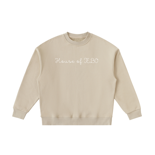 Kids fleece crewneck sweatshirt, beige, front “House of JEBO” print.