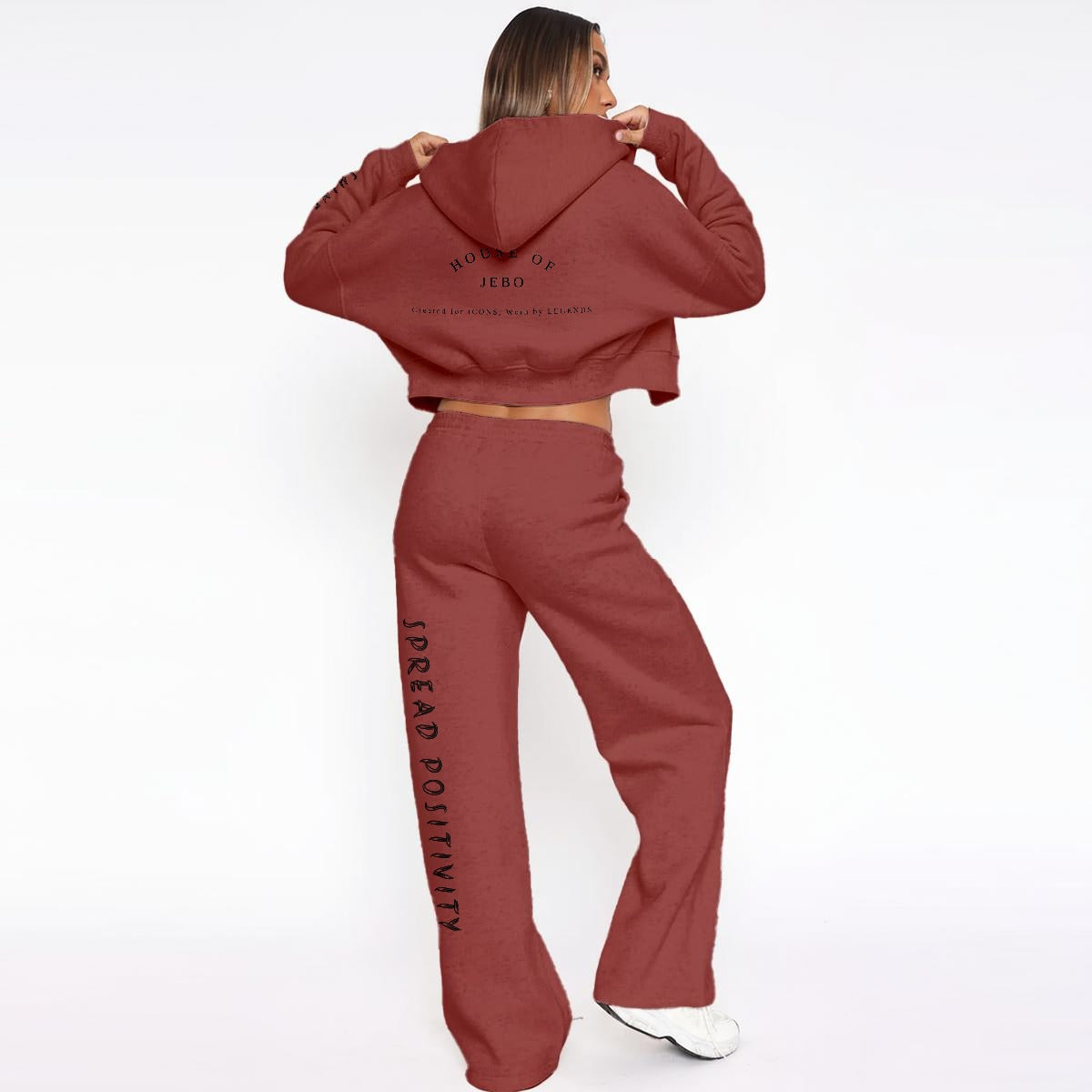Women’s fleece tracksuit set in maroon: hooded zip jacket and wide-leg pants with side print