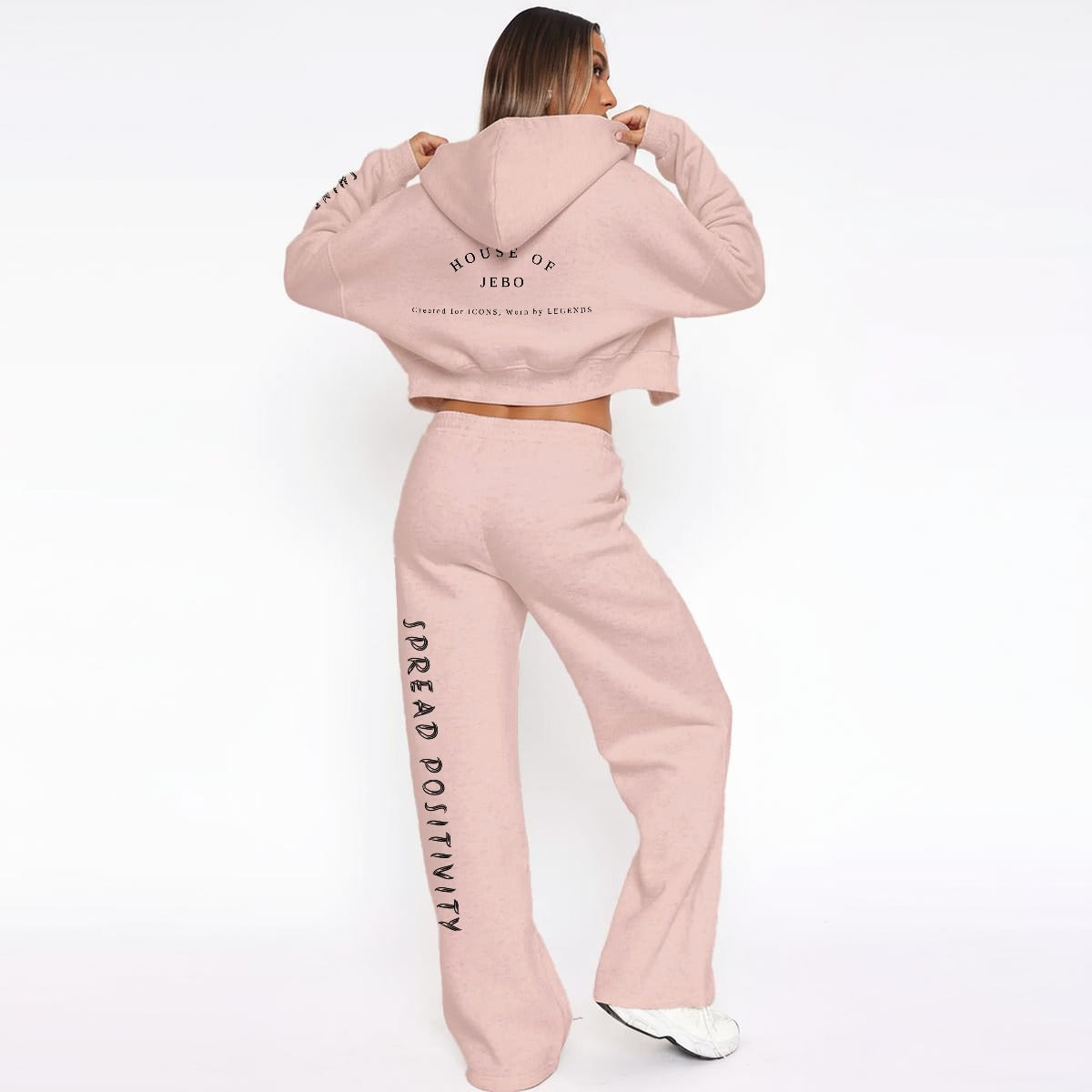 Women’s pink fleece tracksuit set with zip hoodie and wide-leg sweatpants, back graphic.