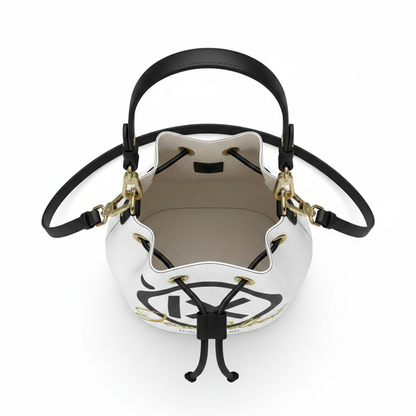 White bucket bag with black top handles, drawstring closure, and gold hardware