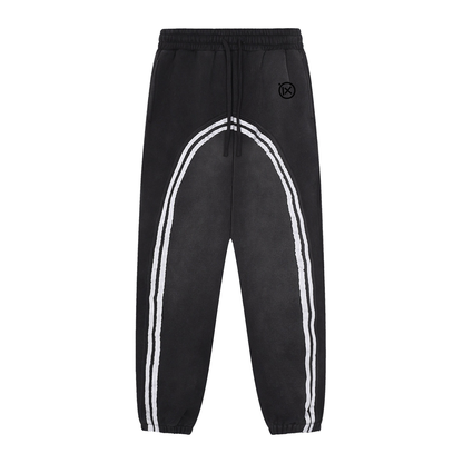 Black joggers with white arched stripe, elastic waistband, and drawstring