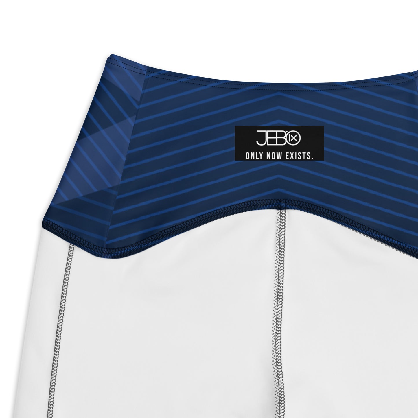 Dark blue performance leggings with striped wave pattern and wide waistband