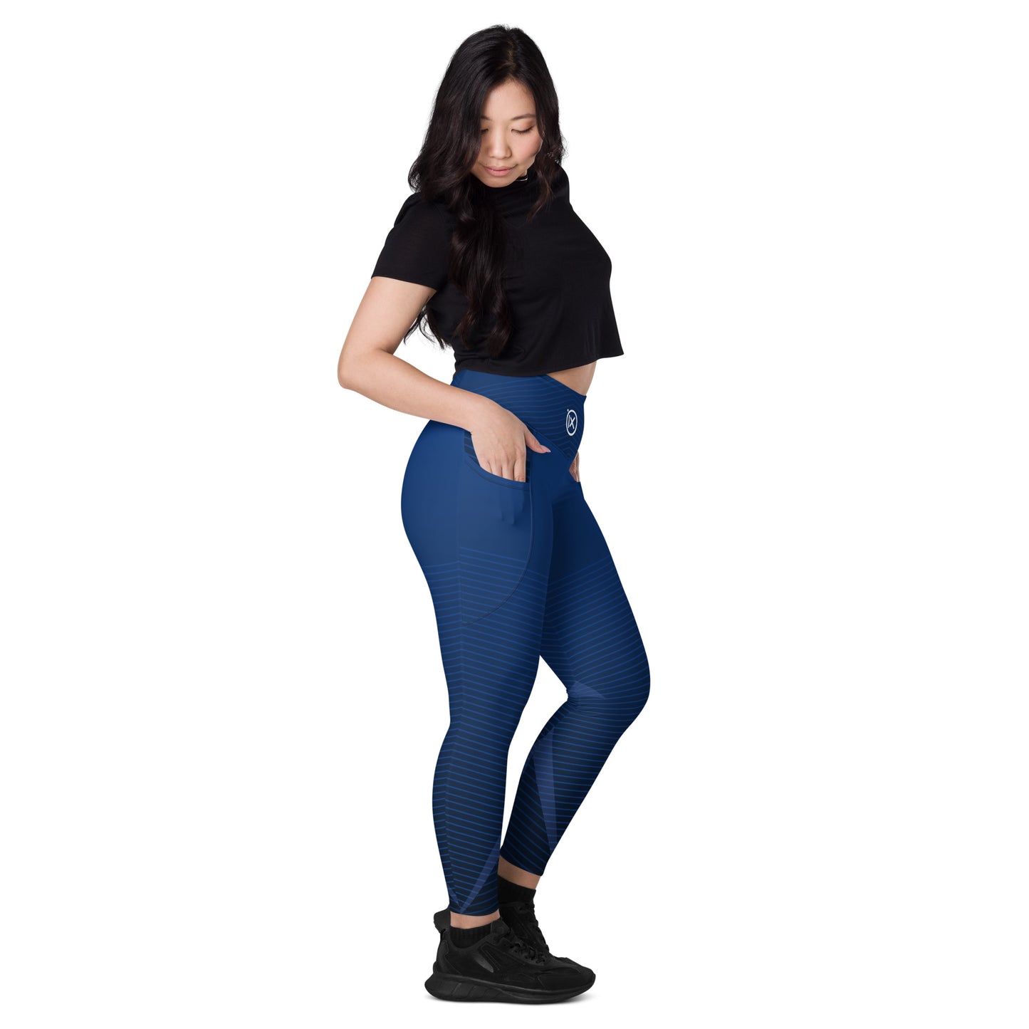 Dark blue performance leggings with geometric lines and side pocket, full length