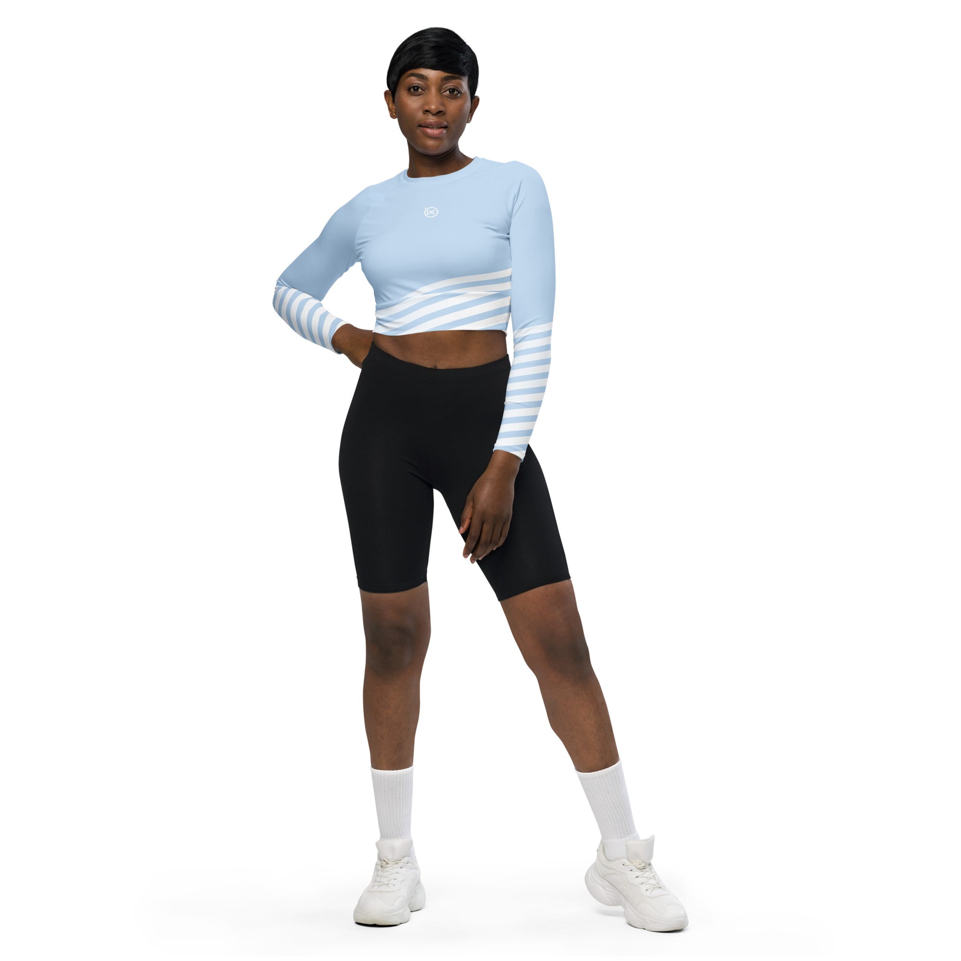Light blue long-sleeve crop top with white-and-blue horizontal striped band and logo