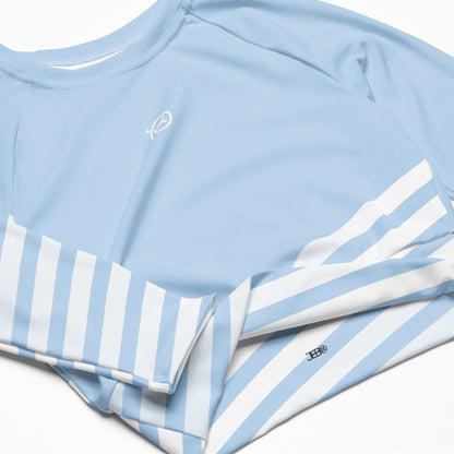 Light blue long sleeve crop top fabric close-up with white-and-blue stripes and logo