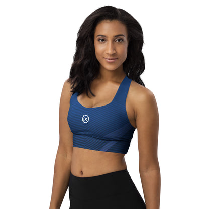 Blue patterned sports bra with scoop neckline, wide straps, and small ix logo at chest.