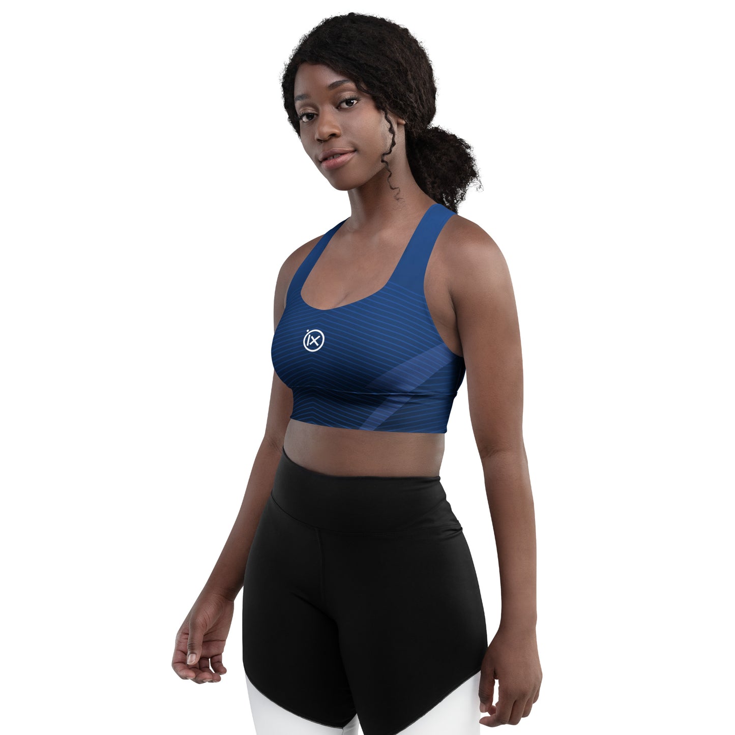 Blue patterned sports bra with scoop neckline and wide straps, ix logo on front panel.
