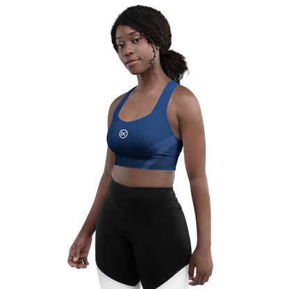 Blue patterned sports bra with scoop neckline and wide straps, ix logo on front panel.