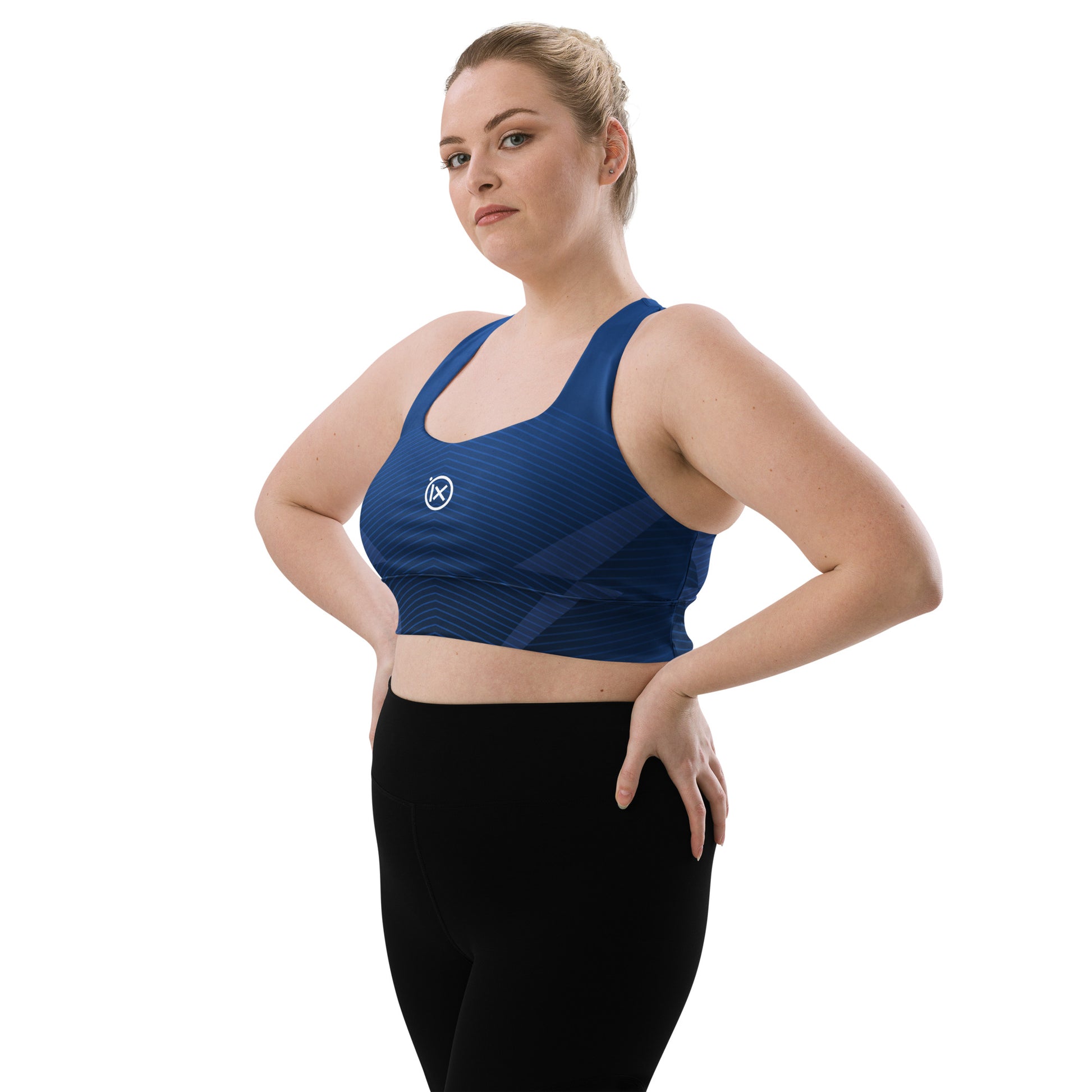 Blue patterned sports bra with scoop neckline and wide straps, ix logo centered on chest.