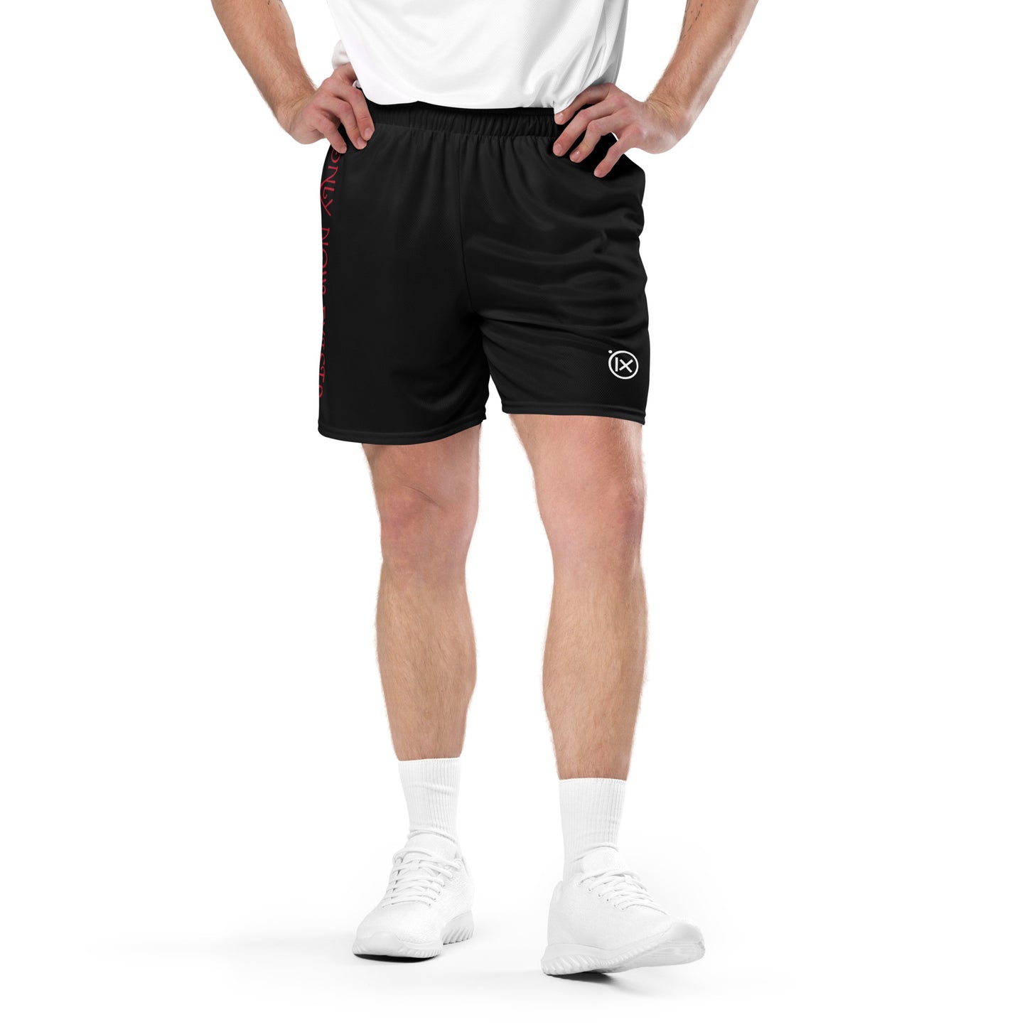 Black performance mesh short worn by model, elastic waistband and side logo patch