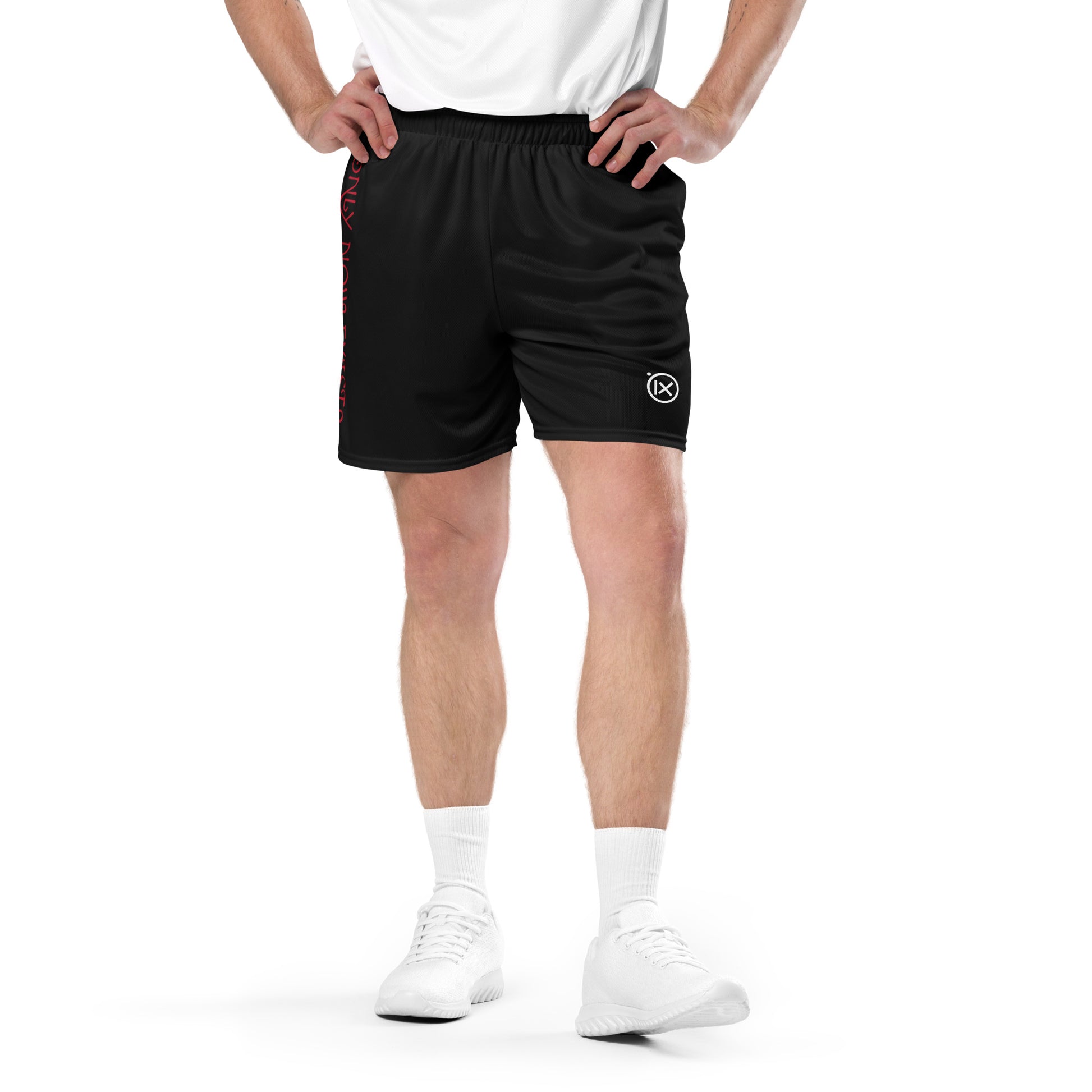 Black performance mesh short worn by model, elastic waistband and side logo patch