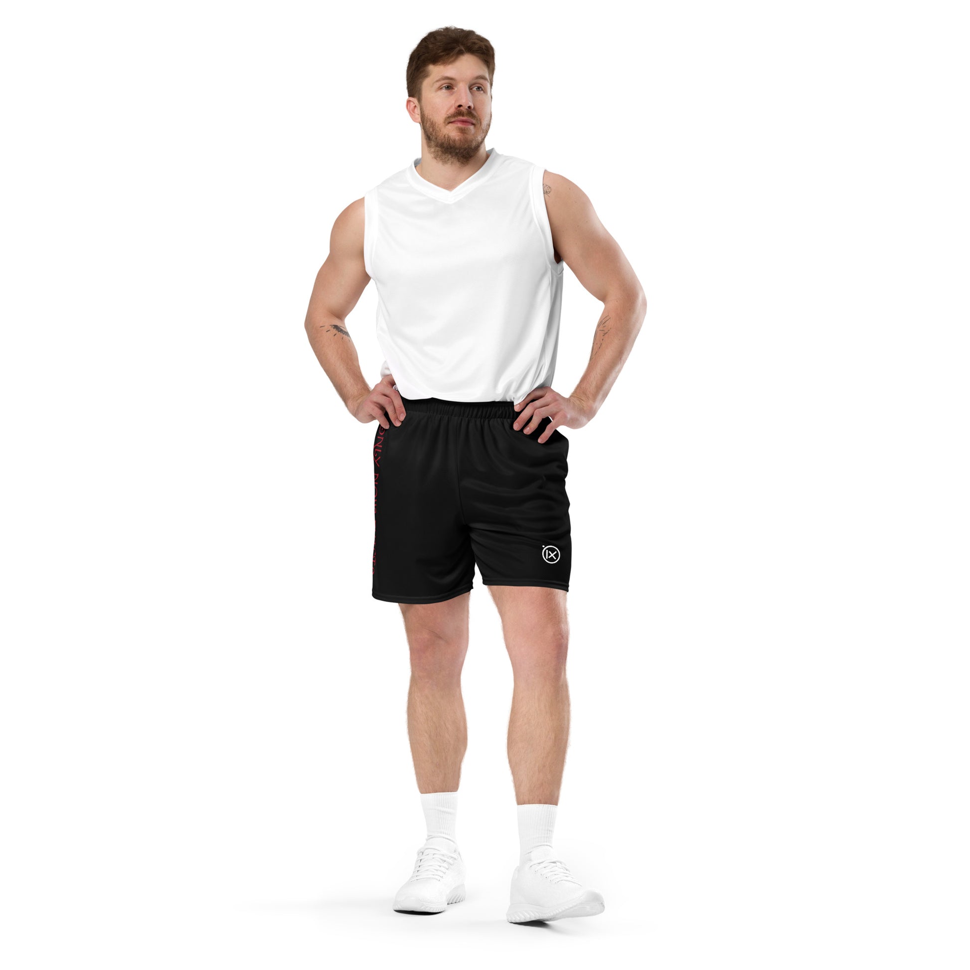 Black performance mesh short worn by model, elastic waistband and side logo patch