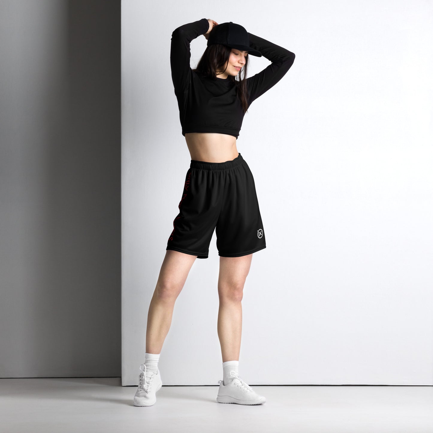 Black performance mesh short on model, elastic waistband and side logo print on leg