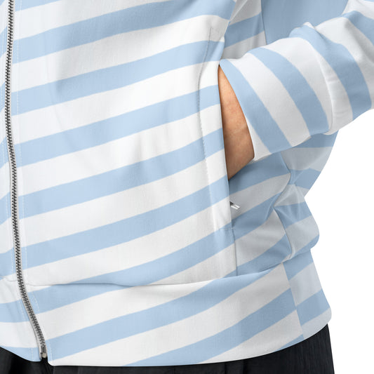 Light blue track jacket close-up of striped panels and front zipper