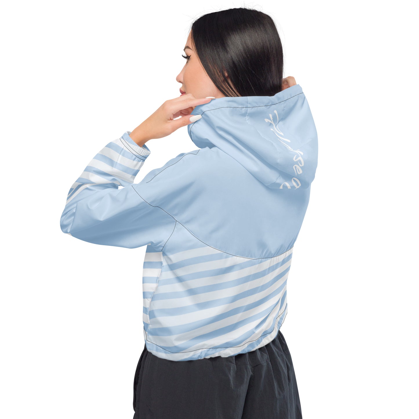 Cropped windbreaker in light blue with white stripes, hood and zip back with emblem detail