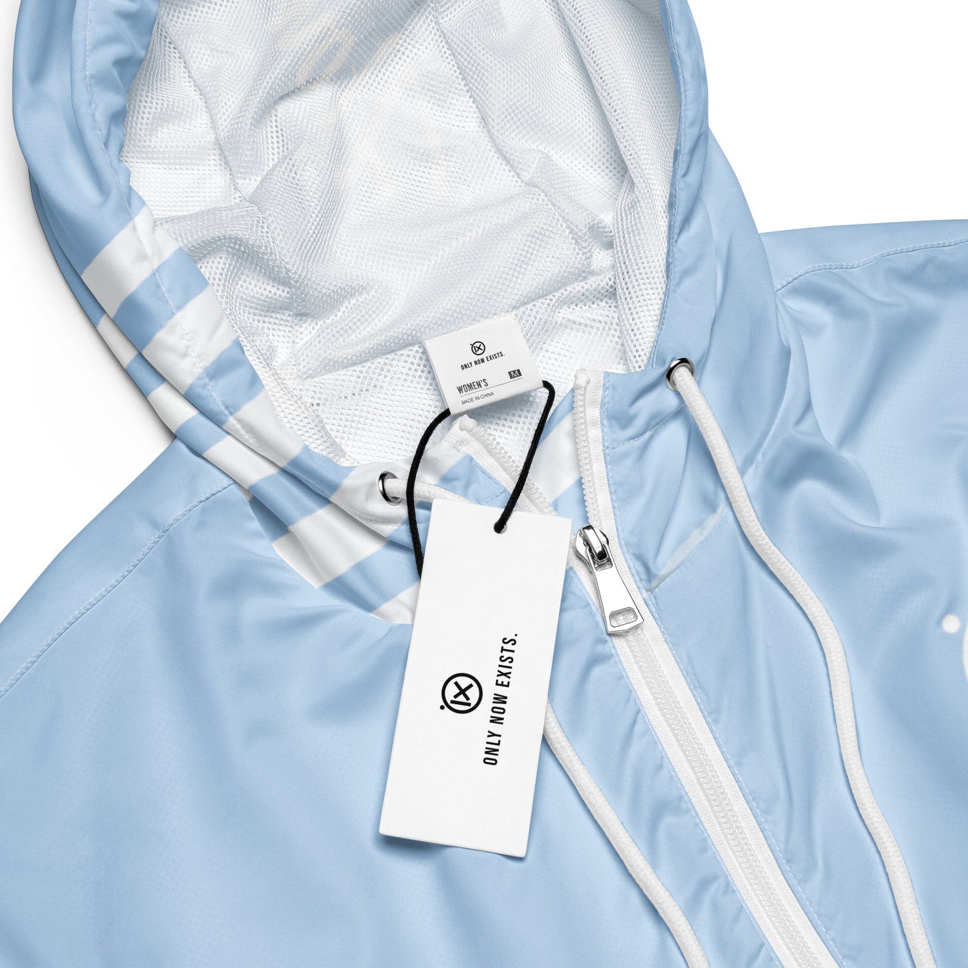 Light blue windbreaker zipper and drawcord with mesh-lined hood interior