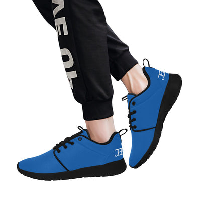 Blue lace-up running shoes worn with black jogger pants