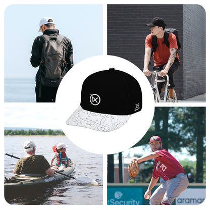 Black baseball cap with white patterned brim and ix logo on the crown