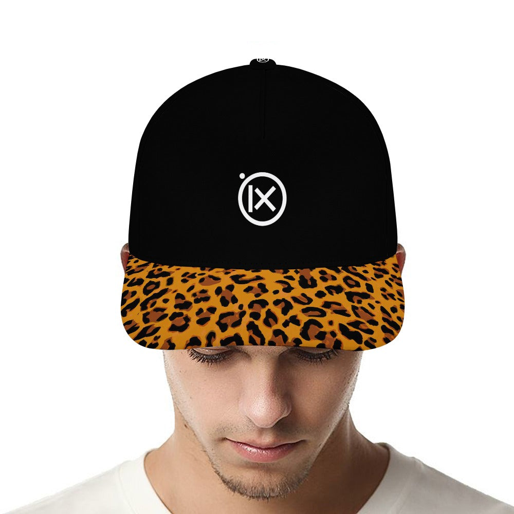 Baseball cap with black crown and leopard-print brim, front iX logo patch.