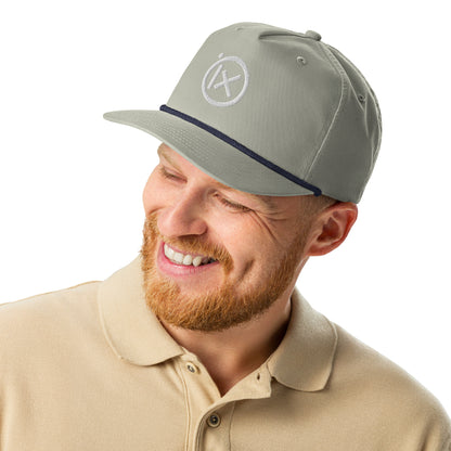 Gray golf snapback cap with navy trim and white circular X logo on front.
