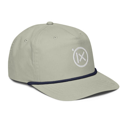 Light gray golf snapback cap with navy trim and white circular X logo on front.