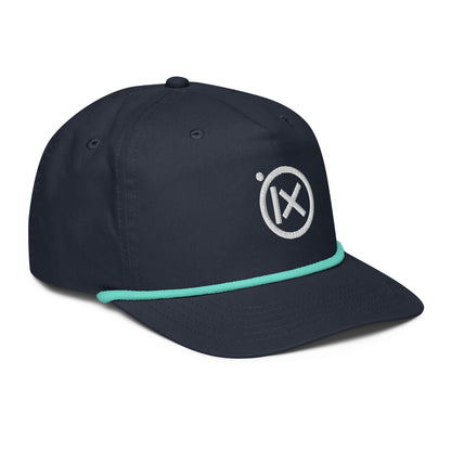 Navy golf snapback cap, angled side view, with turquoise rope trim and X logo.