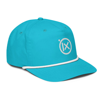 Turquoise golf snapback cap, side view, with white rope trim and circular X logo.