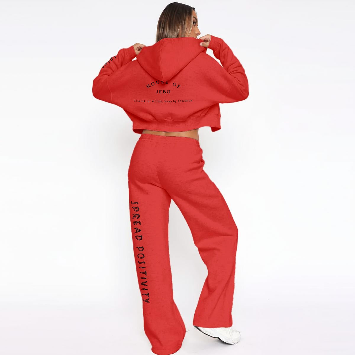 Women’s fleece tracksuit set in red from back view: cropped hoodie and wide-leg joggers.