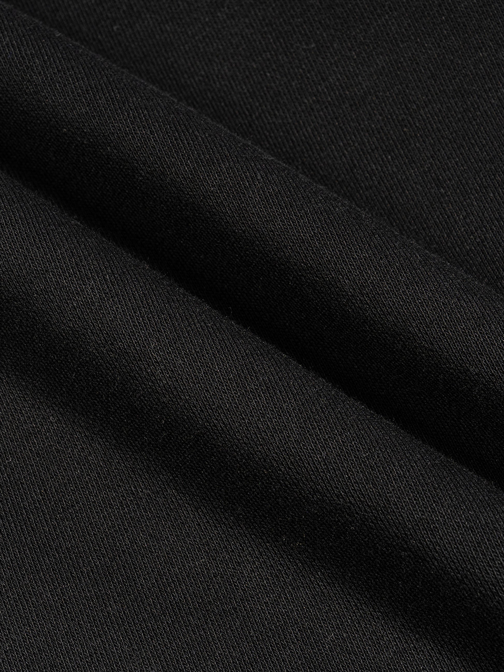 Black French terry boxy tank fabric close-up